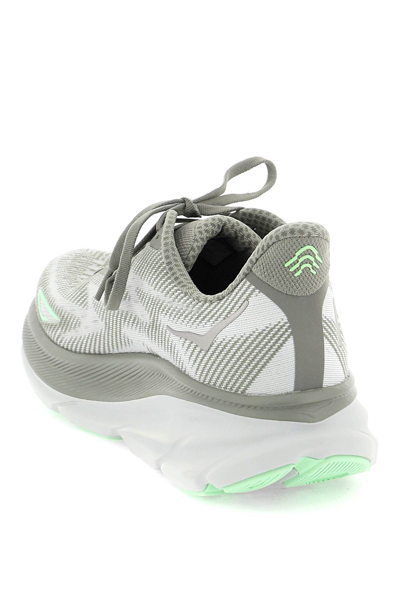 Shop Hoka Clifton 9 Sneakers In Olive Haze Mercury (khaki)