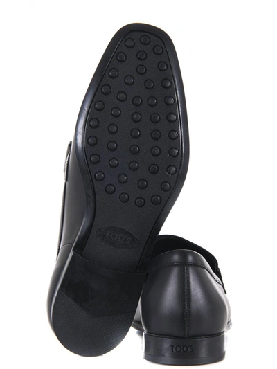 Tod's Round Toe Slip-on Loafers In Black