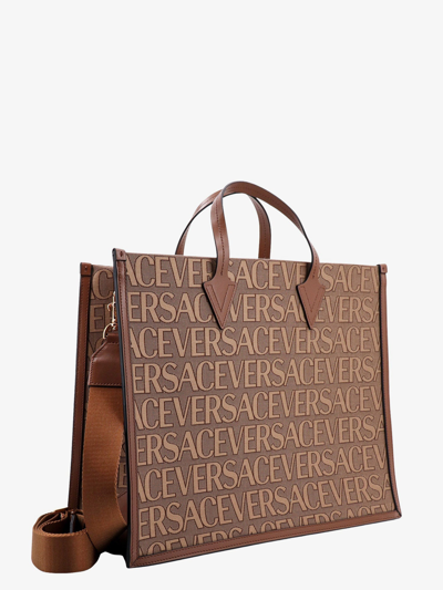 Shop Versace Man Handbag Man Brown Handbags