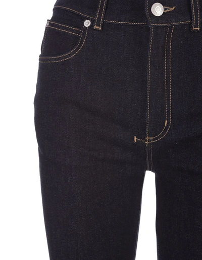 Shop Alexander Mcqueen Dark Denim Flared Jeans In Blue