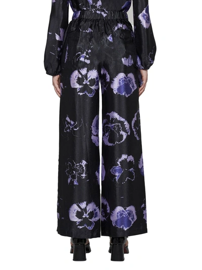 Shop Baum Und Pferdgarten Trousers In Purple Pansy Print