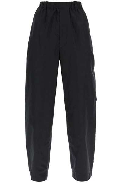 Shop Lemaire Loose Pants In Silk In Black