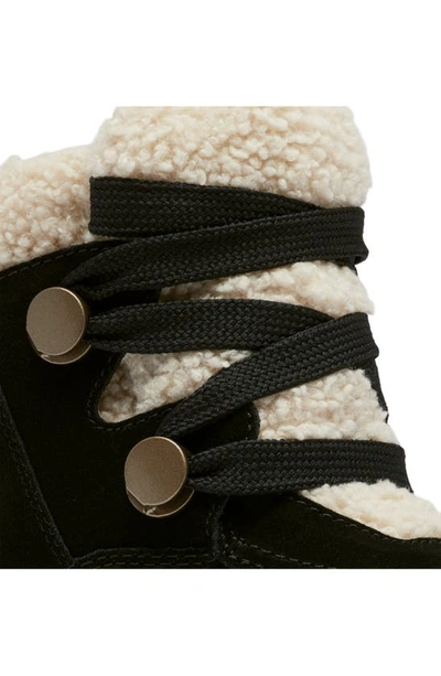 Shop Sorel Out N About Faux Shearling Bootie In Black/ White