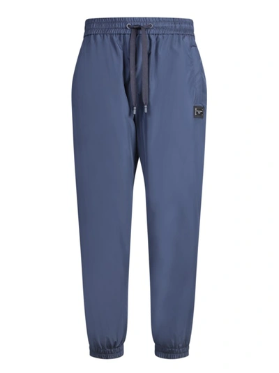 Shop Dolce & Gabbana Track Pants With Elasticated Drawstring And Tapered Leg In Blue