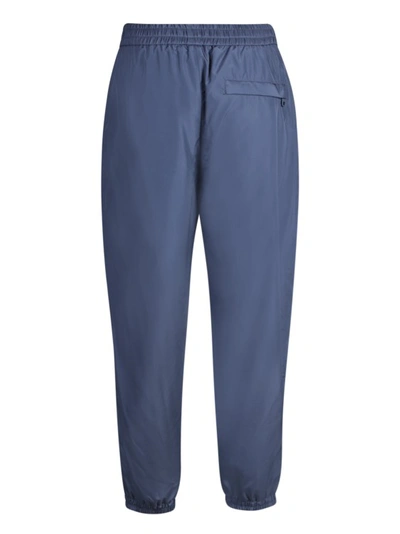 Shop Dolce & Gabbana Track Pants With Elasticated Drawstring And Tapered Leg In Blue