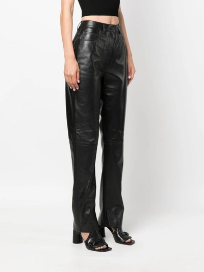 Shop Calvin Klein Black Slim-fit Trousers