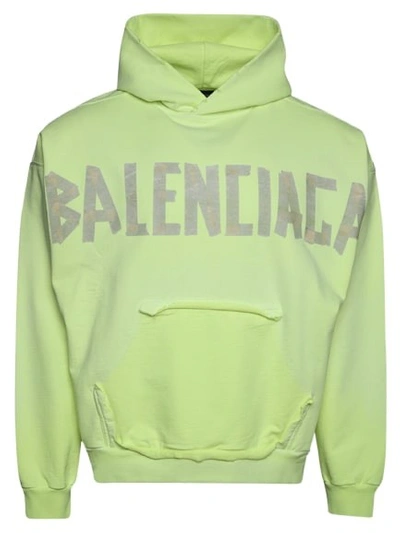 Shop Balenciaga Ripped Pocket Hoodie In Yellow