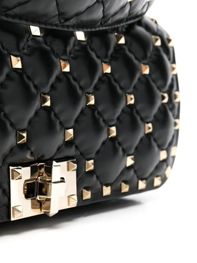 Shop Valentino Rockstud Embellished Shoulder Bag In Black