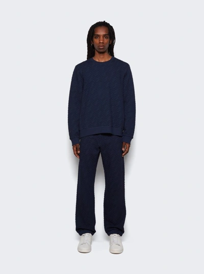 Shop Fendi Embossed Jersey Sweatpants In Blue
