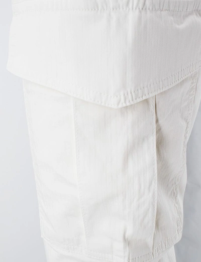 Shop Eleventy Trousers In White