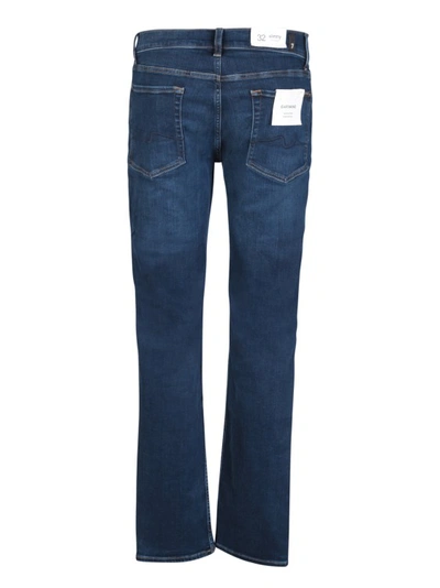 Shop 7 For All Mankind Slimmy Stretch Tapered Cotton Jeans In Blue