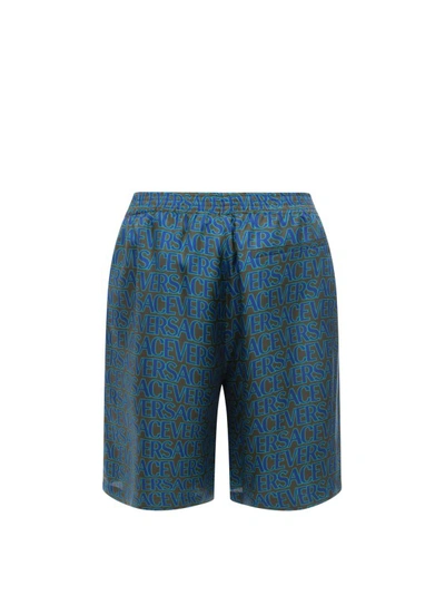 Shop Versace Silk Bermuda Shorts With Allover Print In Blue