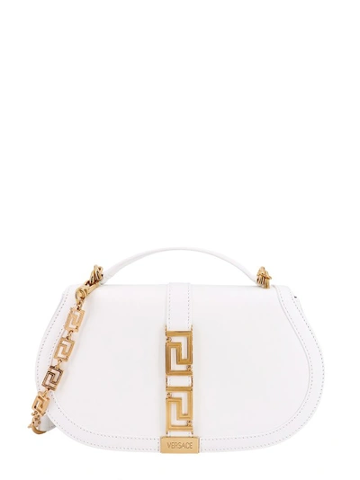 Shop Versace Leather Handbag With Frontal Metal La Greca Detail In White