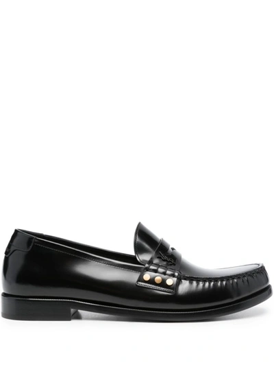 Shop Saint Laurent Almond-toe Leather Loafers In Black