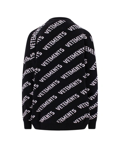 Shop Vetements Merino Wool Sweater With All-over Logo In Black