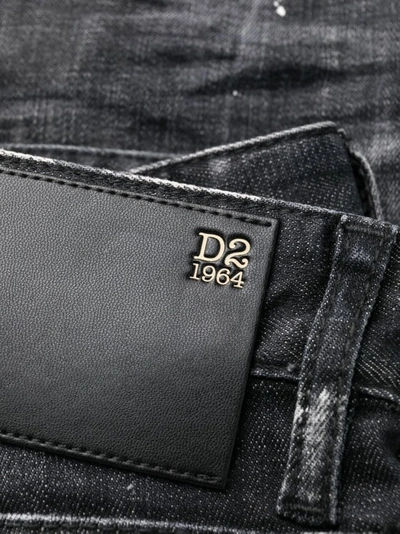 Shop Dsquared2 Distressed 1964 Slim Jeans In Black