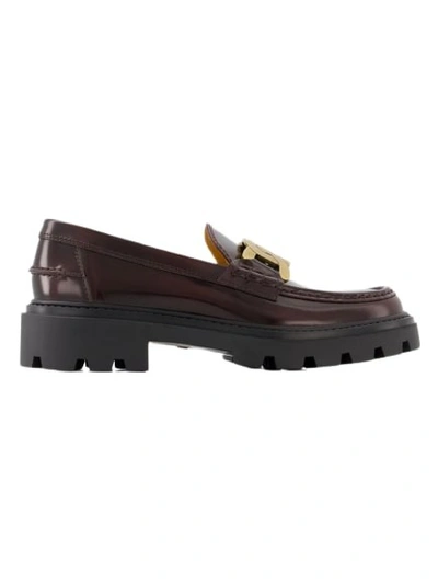 Shop Tod's Heavy Rubber Loafers - Leather - Burgundy