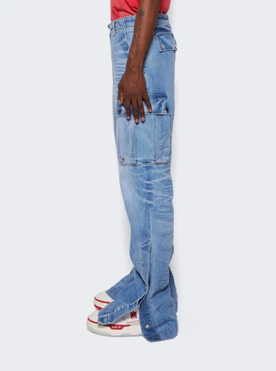 Shop Amiri M65 Cargo Kick Flare Jeans In Blue