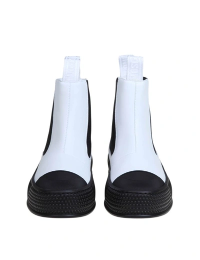 Shop Moschino Ankle Boot In Black And White Vegan Leather