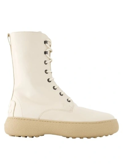 Shop Tod's Winter Gommini Boots - Leather - White