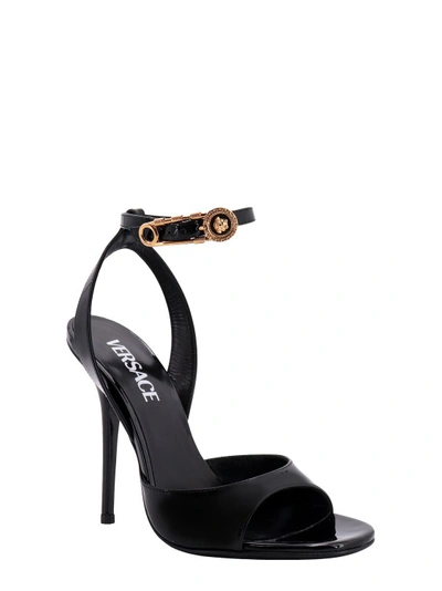 Shop Versace Patent Leather Sandals With Safety Pin Detail In Black