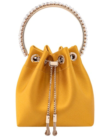 Shop Jimmy Choo Satin Bucket Bag With Crystals Detail In Yellow