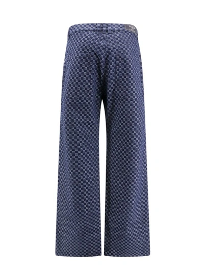 Shop Balmain Cotton Loose Fit Jeans With All-over Monogram In Blue