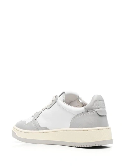 Shop Autry Grey Leather Sneakers In White