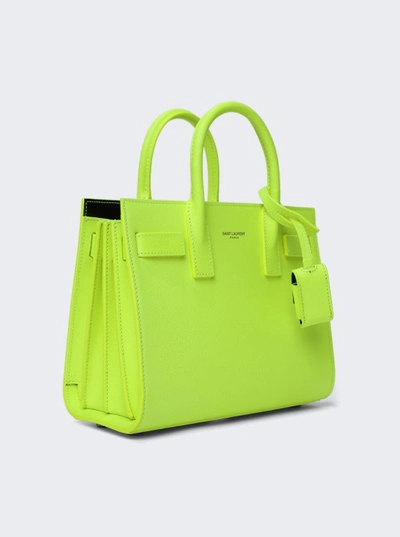Shop Saint Laurent Nano Sac De Jour Top Handle Bag In Yellow