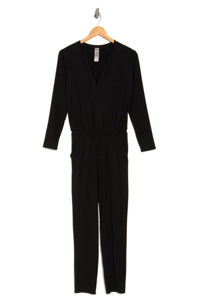 Shop Go Couture Split Neck Long Sleeve Jumpsuit In Black
