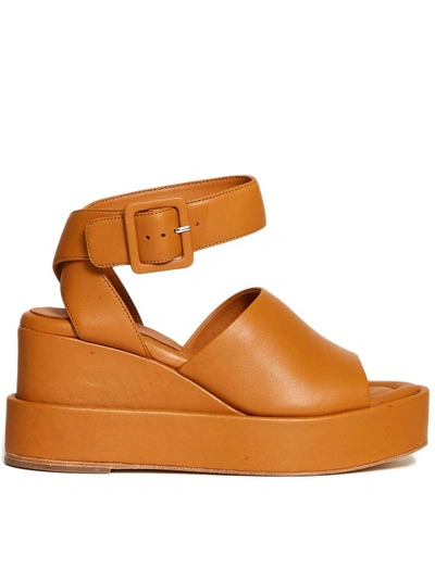 Shop Paloma Barceló Ankle Strap Leather Wedge Sandals In Orange