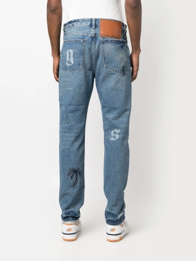 Shop Palm Angels Blue Cotton Jeans