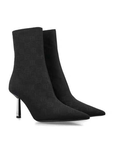 Shop Misbhv Sasha Monogram Ankle Boot In Black
