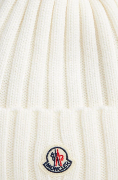 Shop Moncler Virgin Wool Rib Beanie With Faux Fur Pompom In White