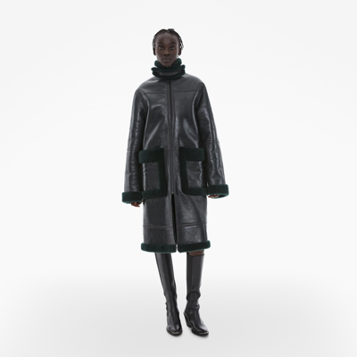 Shop Helmut Lang Patent Leather Shearling Coat In Evergreen