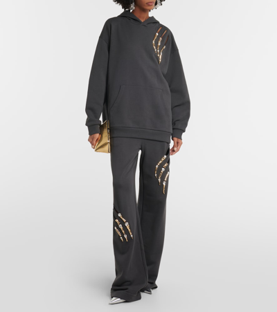 Shop Area Claw Embellished Cutout Sweatpants In Black