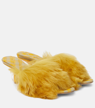 Shop Burberry Jackie Shearling And Leather Mules In Yellow
