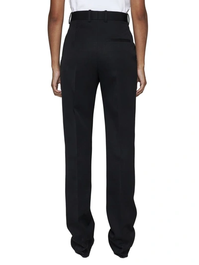 Shop Bottega Veneta Trousers In Black