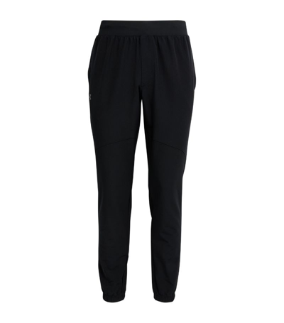 Shop Under Armour Stretch Woven Sweatpants In Black