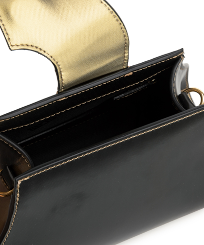 Shop Gcds Comma Handbag In Gold