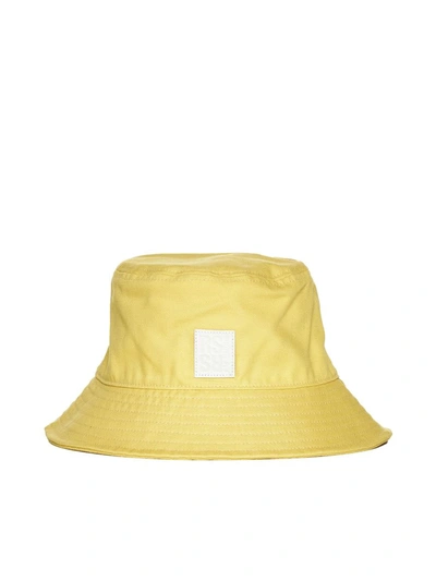 Shop Raf Simons Hats In Yellow