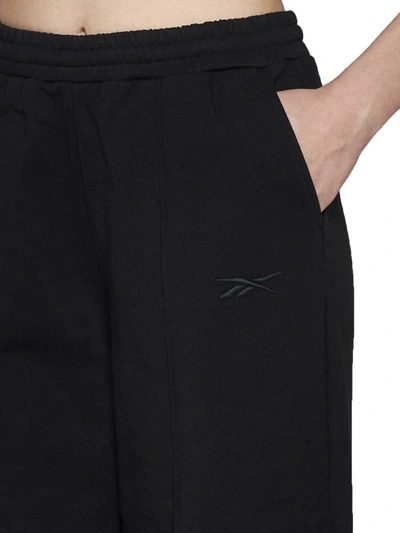 Shop Reebok Trousers In Black