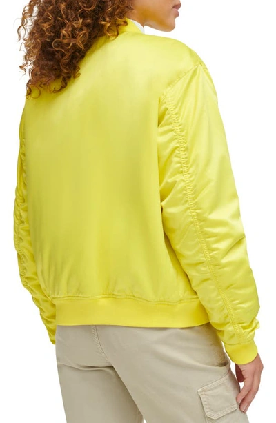 Shop Levi's Oversize Bomber Jacket In Yellow Green Sheen