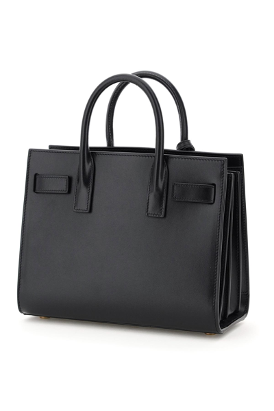 Shop Saint Laurent Nano Sac De Jour Handbag In Black