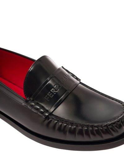 Shop Ferragamo Black Loafers With Embossed Logo In Smooth Leather Woman