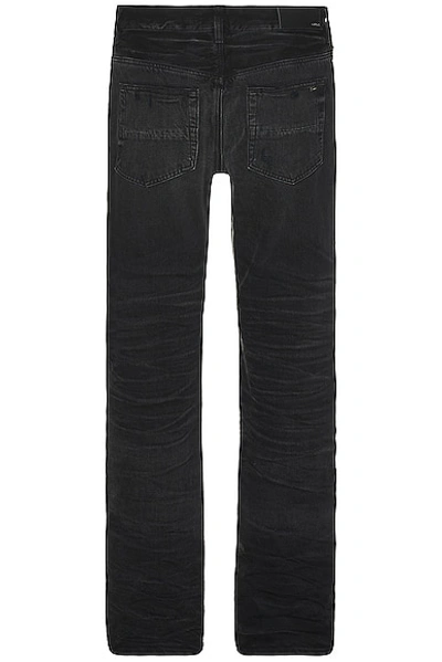 Shop Amiri Stack Straight Jean In Faded Black