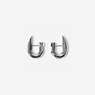 Shop Burberry Hollow Spike Earrings In Silver