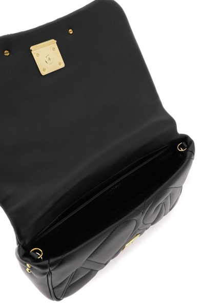Shop Alexander Mcqueen Seal Shoulder Bag In Black