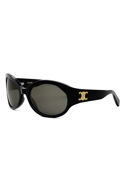 Shop Celine Triomphe Oval Sunglasses In Shiny Black / Smoke