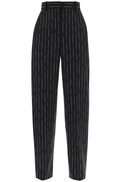 Shop Alexander Mcqueen Broken Pinstripe Trousers In Black